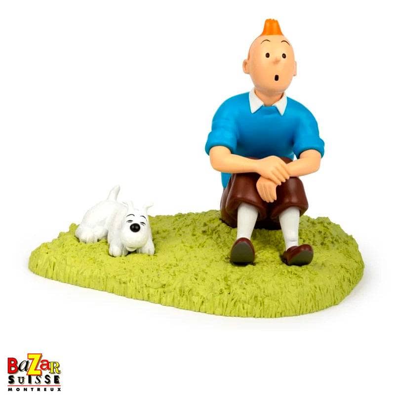Figurine Tintin assis dans l’herbe - Moulinsart